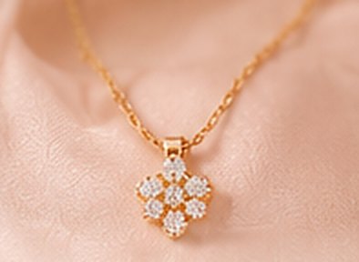 Gold clover pendant necklace set with crystals